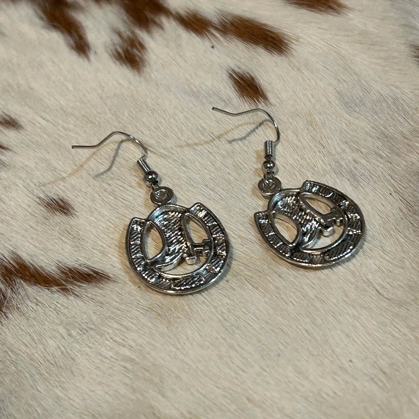 A Horseshoe with a Cowboy Boot Placed Inside