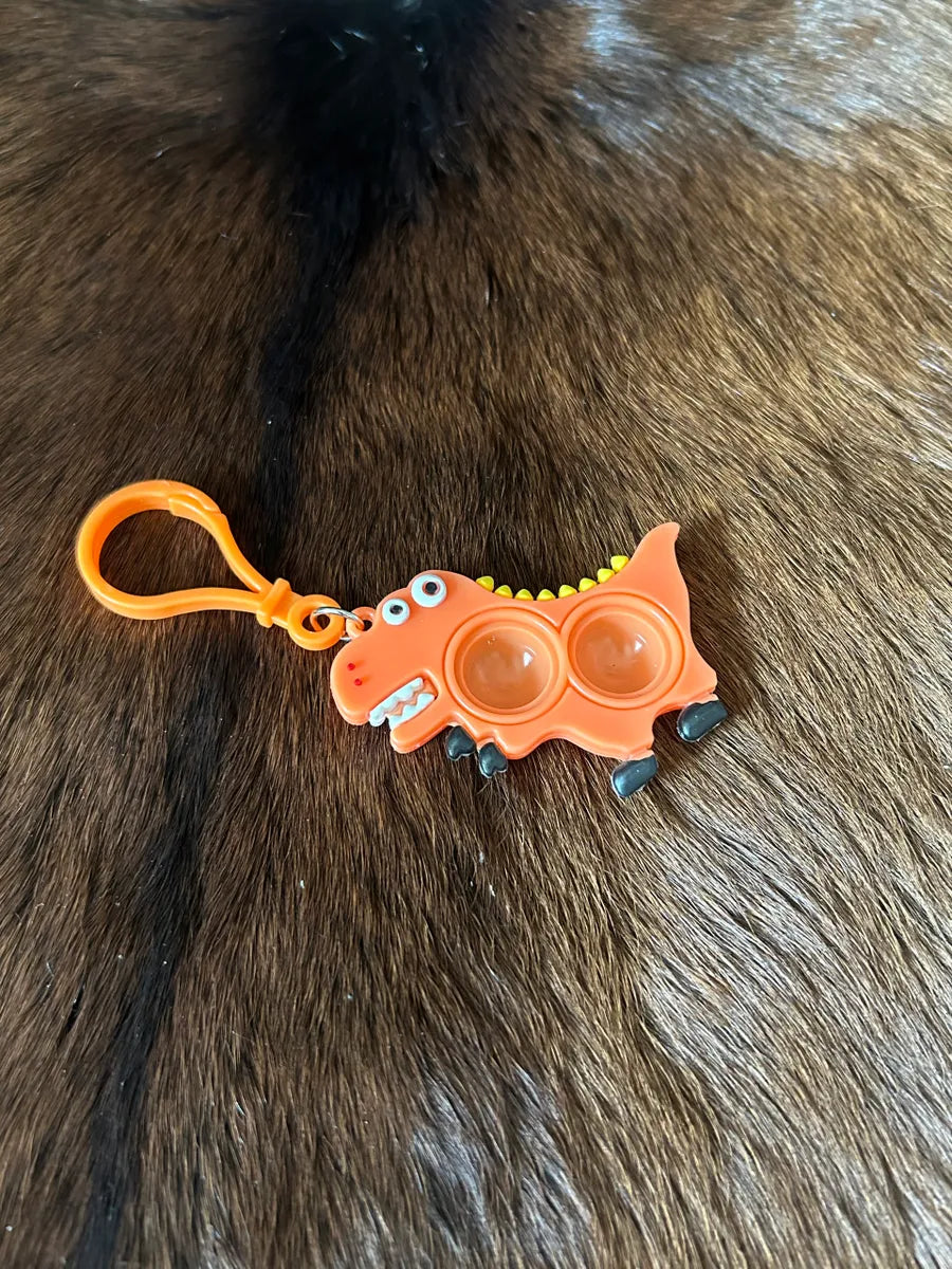 Kids Cartoon Dino Finger Punch Backpack Keychain