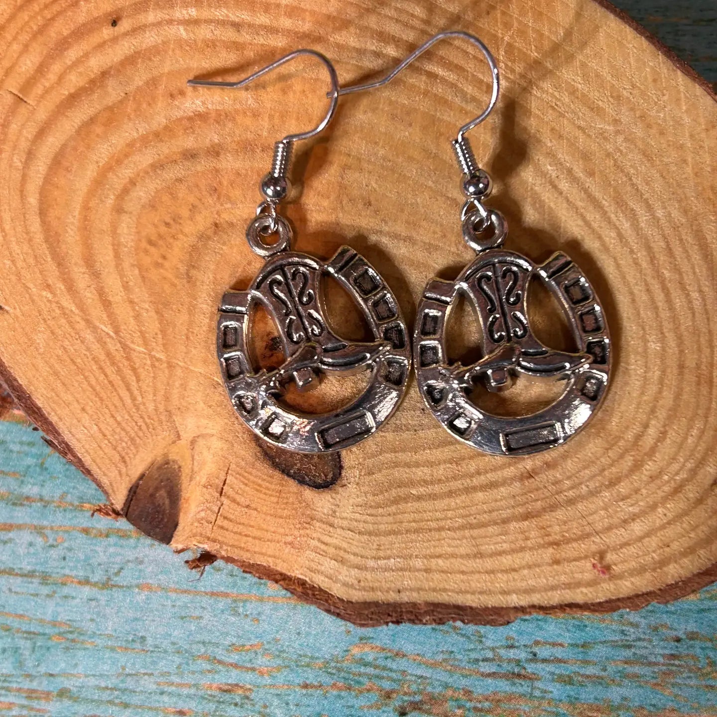 A Horseshoe with a Cowboy Boot Placed Inside