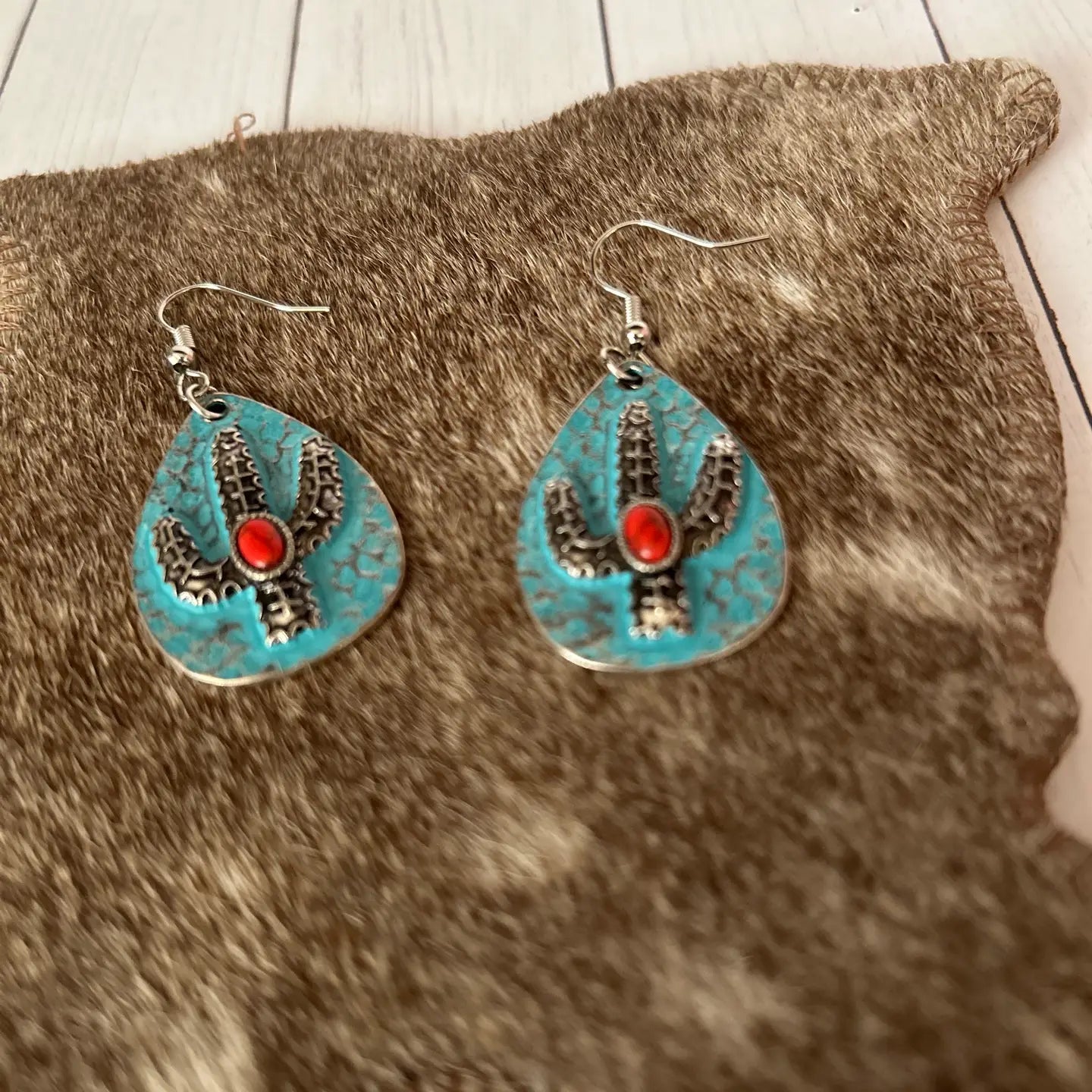 Oval Shape Cactus in the Center Earrings